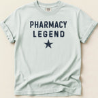 Light blue t-shirt with "PHARMACY LEGEND" and a star.