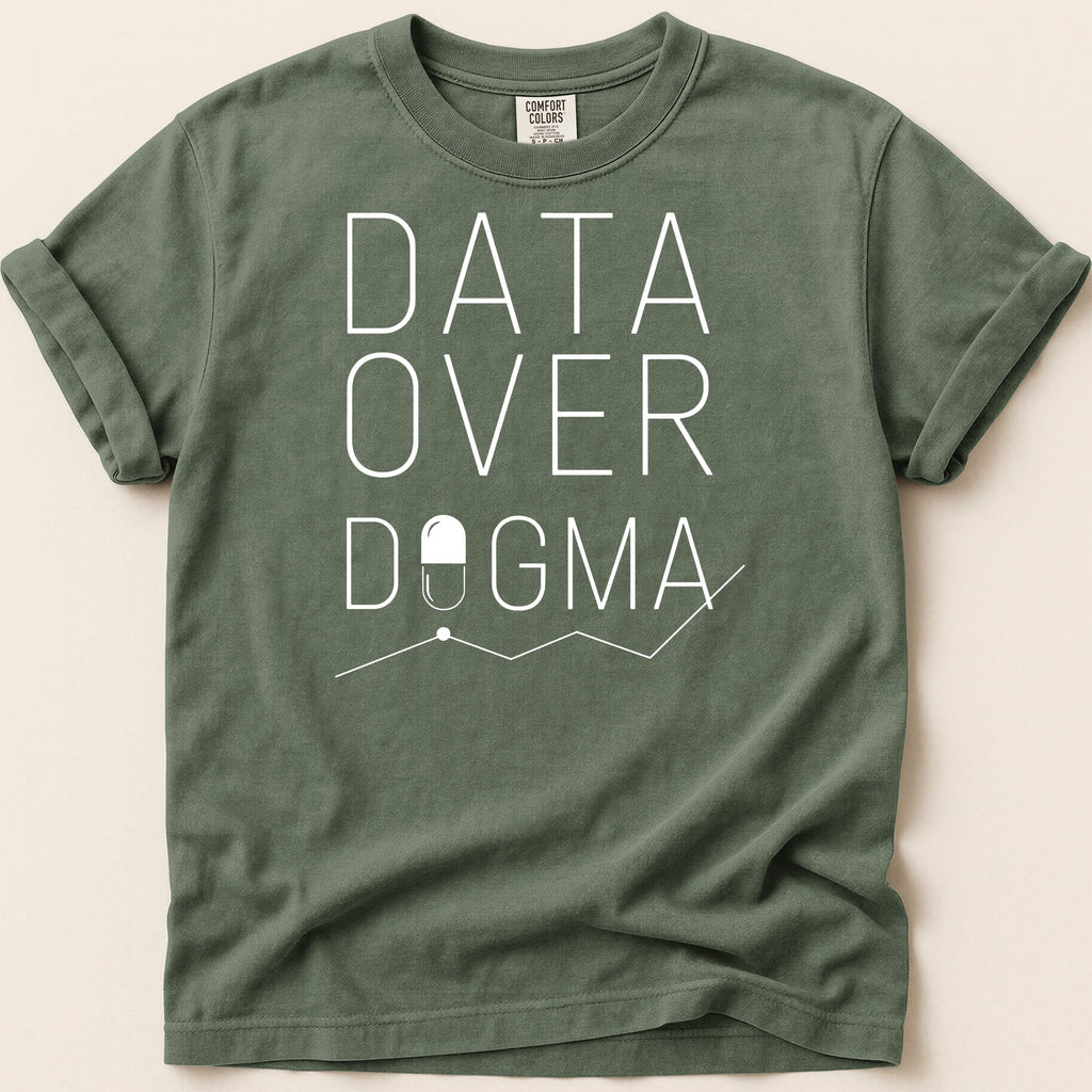 Green t-shirt with "DATA OVER DOGMA" text and capsule graphic.