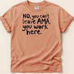 Peach t-shirt with black text that reads "No, you can't leave AMA, you work here."