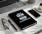 Black notebook with "Keep Calm and Trust Your Pharmacist" in white text.