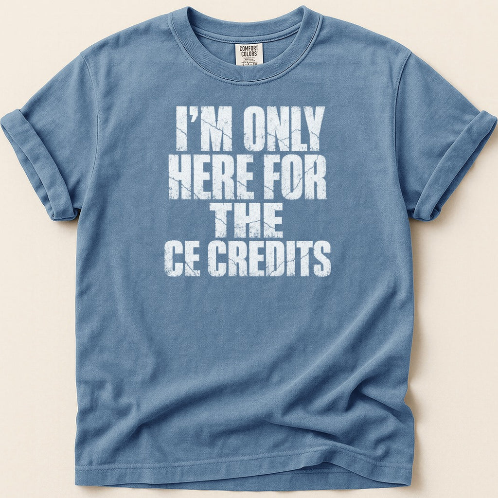 Comfort Colors blue t-shirt with white text "I'M ONLY HERE FOR THE CE CREDITS".