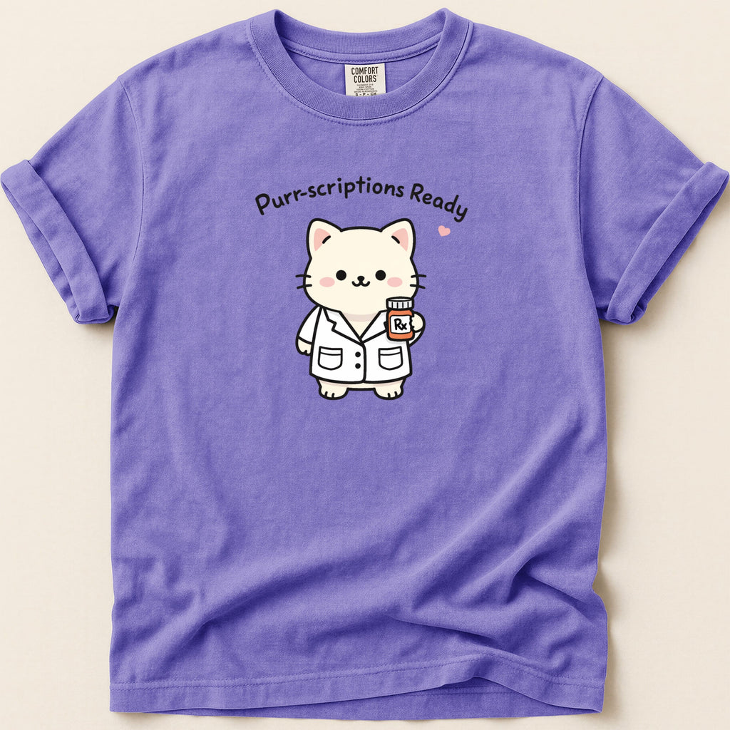 T-shirt with cartoon cat in lab coat holding prescription bottle, "Purr-scriptions Ready" text.