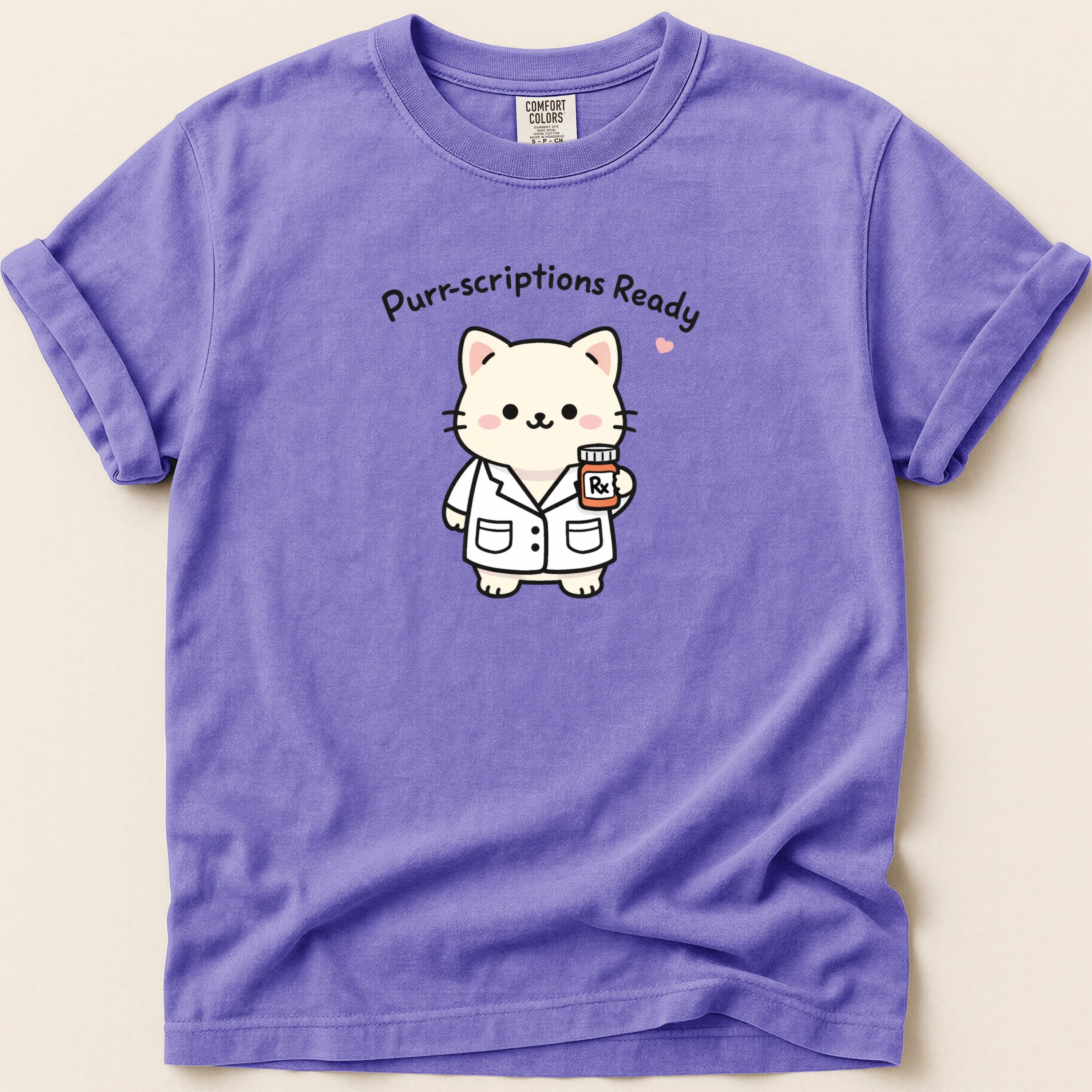 T-shirt with cartoon cat in lab coat holding prescription bottle, "Purr-scriptions Ready" text.