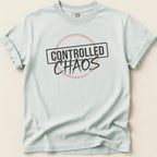 Light blue t-shirt with "CONTROLLED CHAOS" in black text within a red circle.