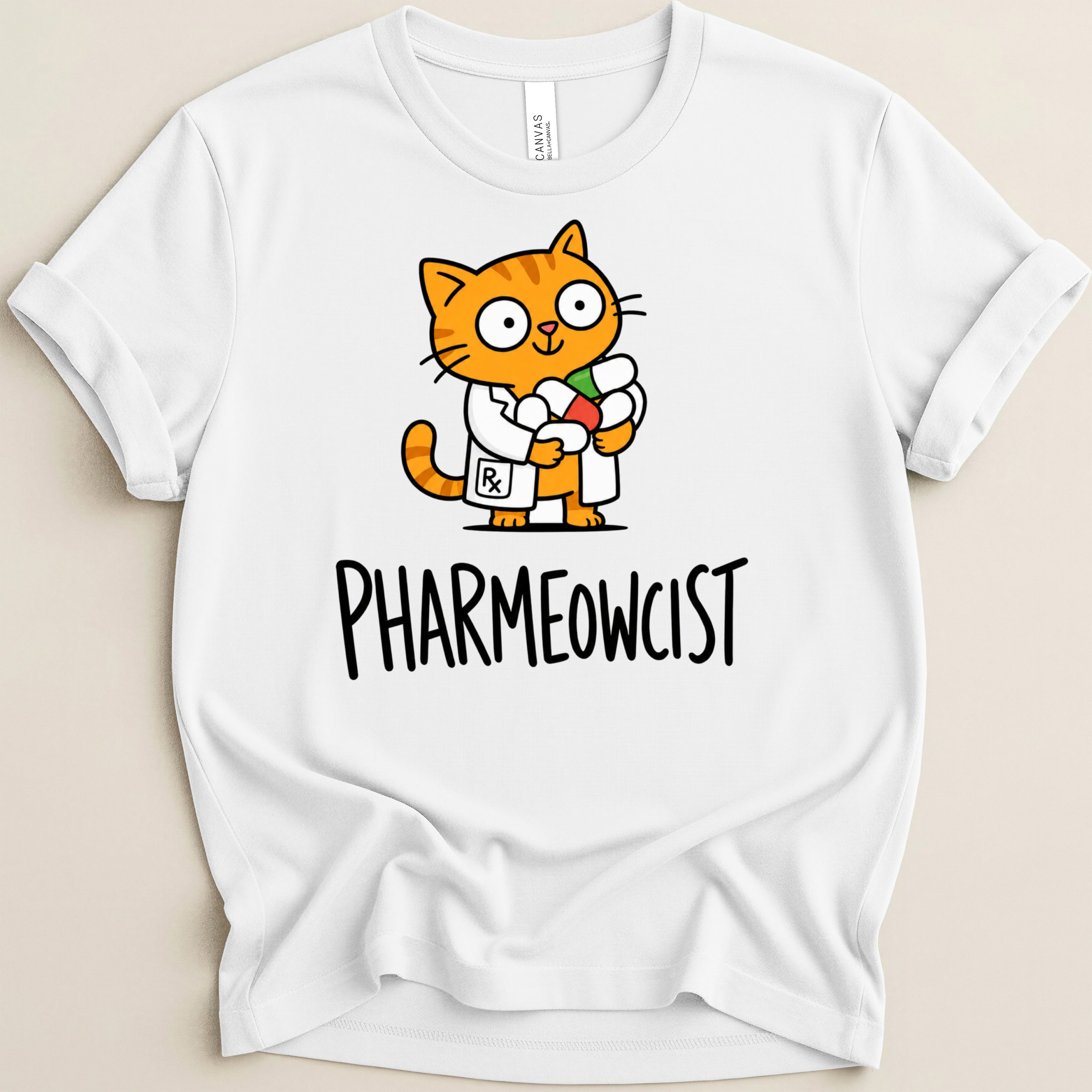 White t-shirt with cartoon cat in lab coat holding pills, text "PHARMEOWCIST".