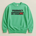 Green Gildan sweatshirt with "PHARMACY STUDENT" text, "STUDENT" crossed out.