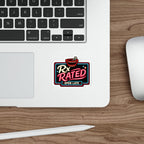 Sticker with neon sign text "Rx Rated Open Late" on a laptop.