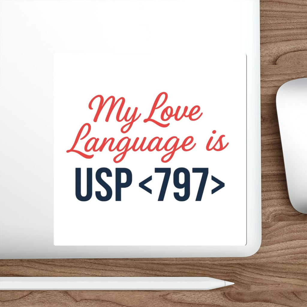 White sticker with text "My Love Language is USP <797>" on a laptop.