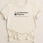 Cream t-shirt with "Certified Potion Dispenser" and a potion bottle graphic.