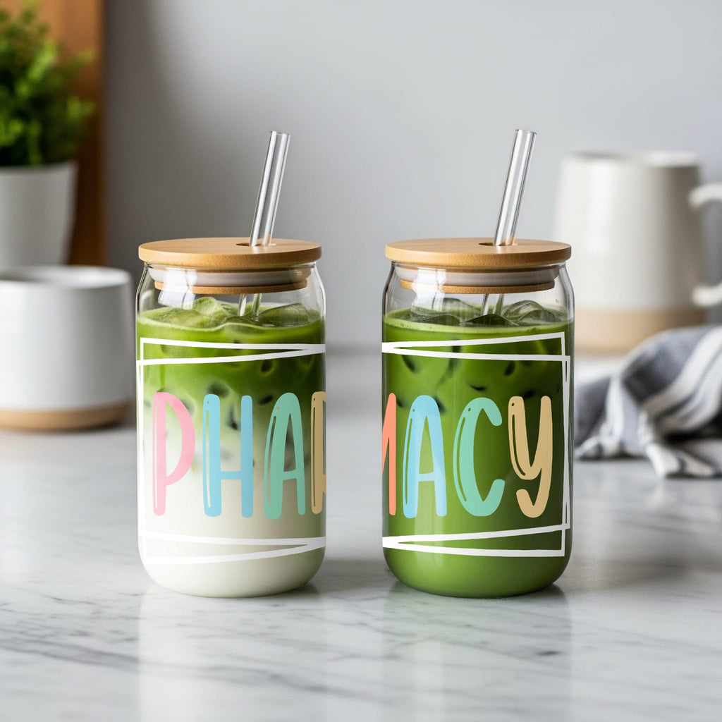 Two glasses with "PHARMACY" text and straws, one with matcha, one with layered drink.