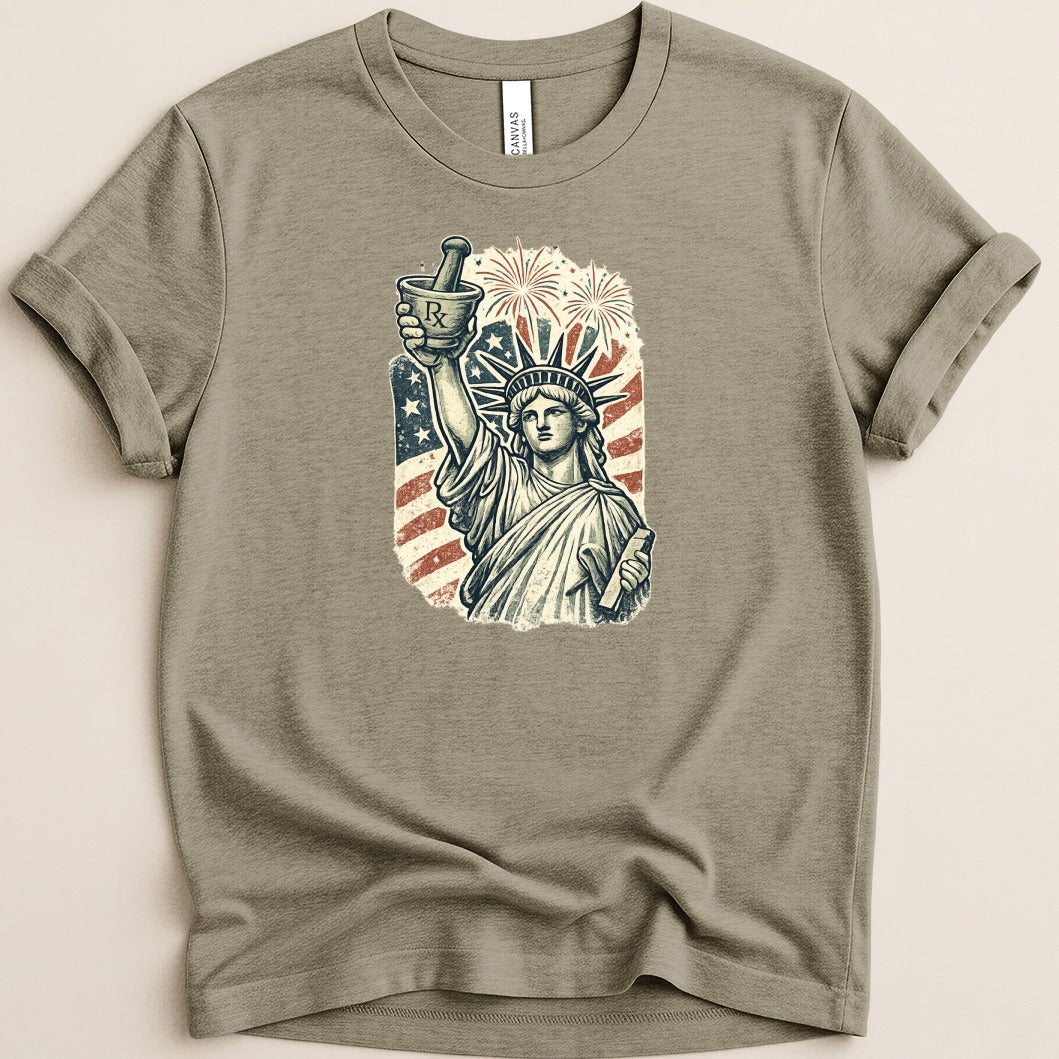 Statue of Liberty holding mortar and pestle with fireworks and flag.