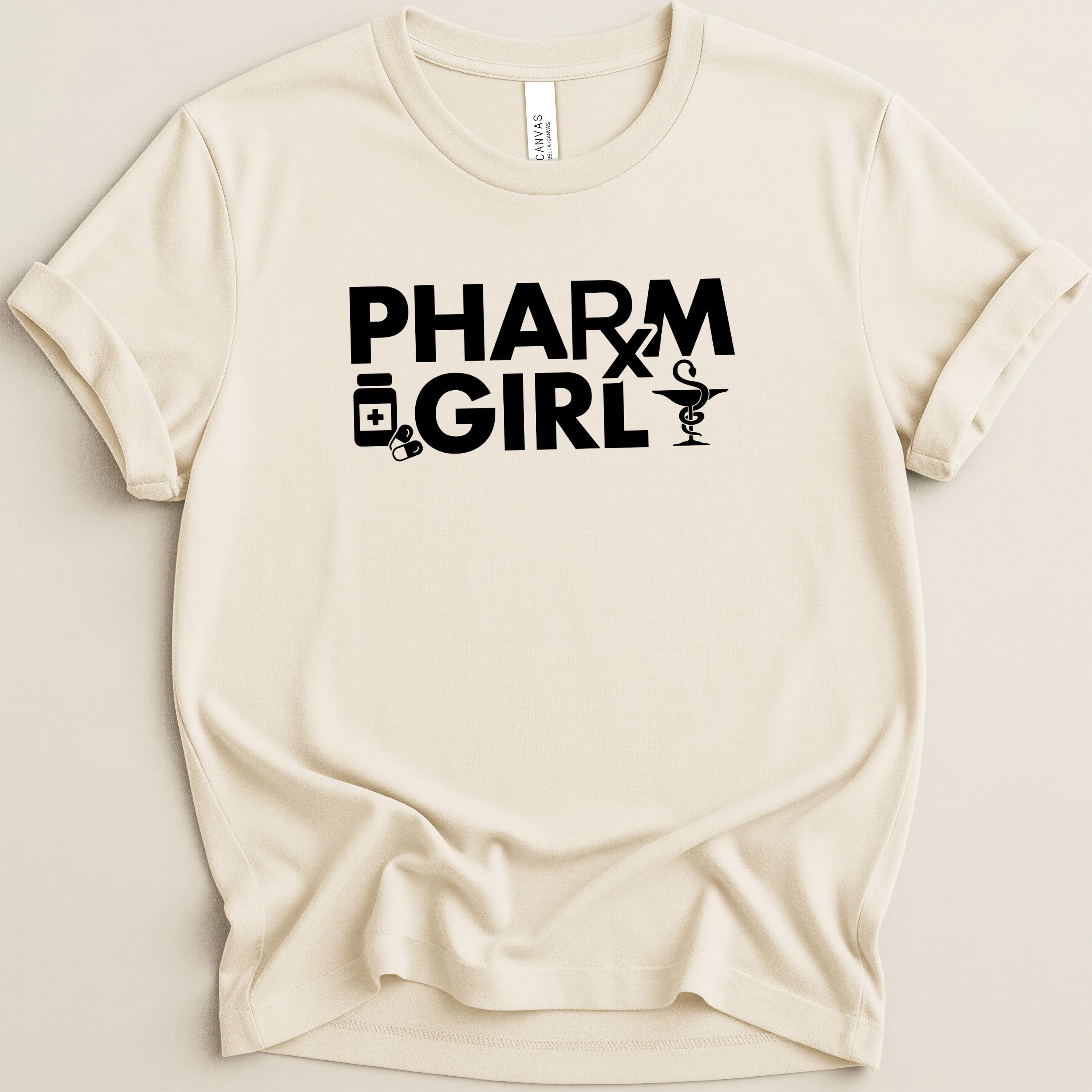 Cream t-shirt with "PHARM GIRL" text and pharmacy symbols.