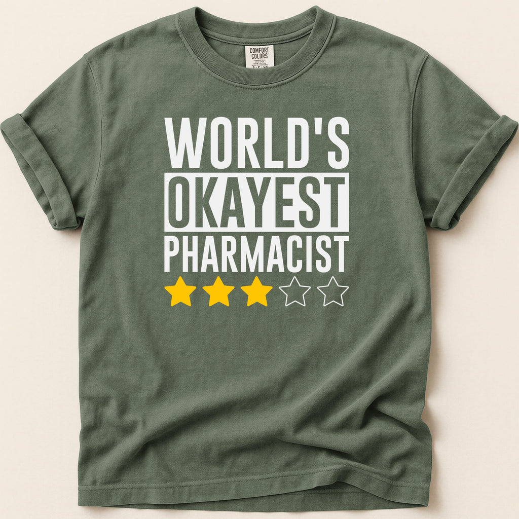 T-shirt with "World's Okayest Pharmacist" and three yellow stars.