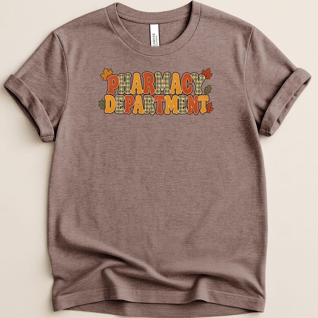 Brown short-sleeve t-shirt with rolled cuffs and the text PHARMACY DEPARTMENT in retro autumn-colored letters.