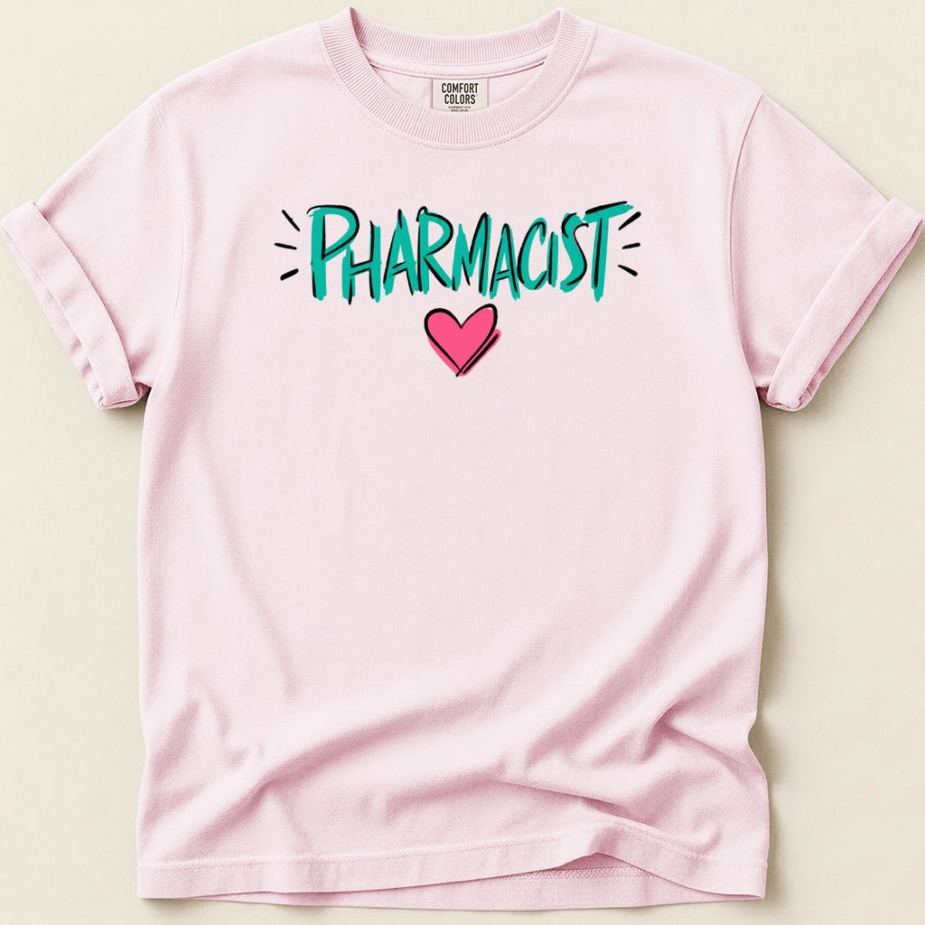 Pink t-shirt with "Pharmacist" in teal lettering and a pink heart.