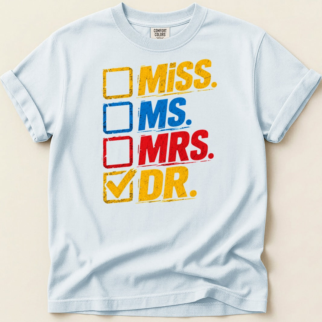 White t-shirt with checkboxes and titles: Miss, Ms., Mrs., Dr. with Dr. checked.