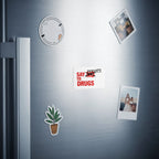 Magnet with "SAY NO TO DRUGS" crossed out and "PERHAPS" written.