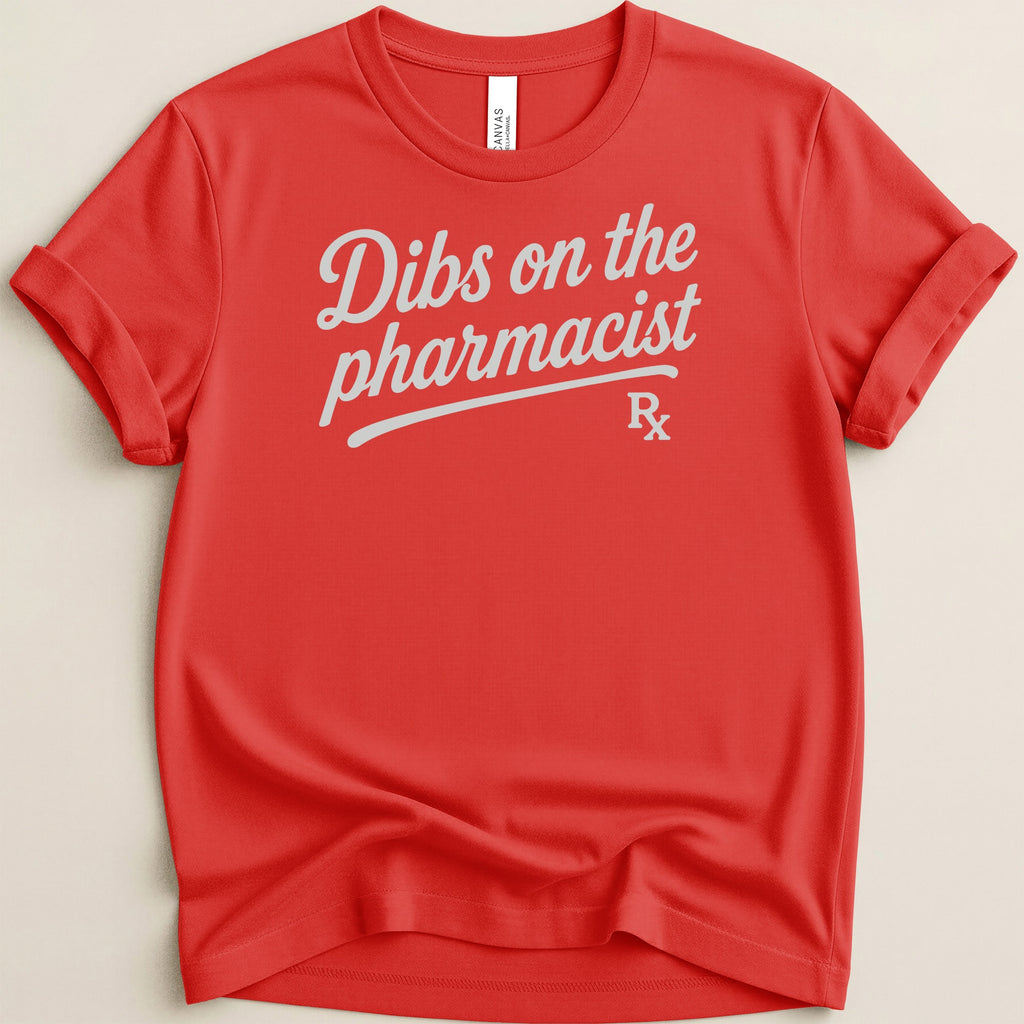 Red t-shirt with light blue text "Dibs on the pharmacist Rx".