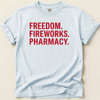 Light blue t-shirt with red text: FREEDOM. FIREWORKS. PHARMACY.