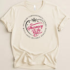Cream t-shirt with "Pharmacy Life" text inside a heart and crown graphic.