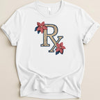 White t-shirt with distressed "RX" symbol accented by flowers and leaves.
