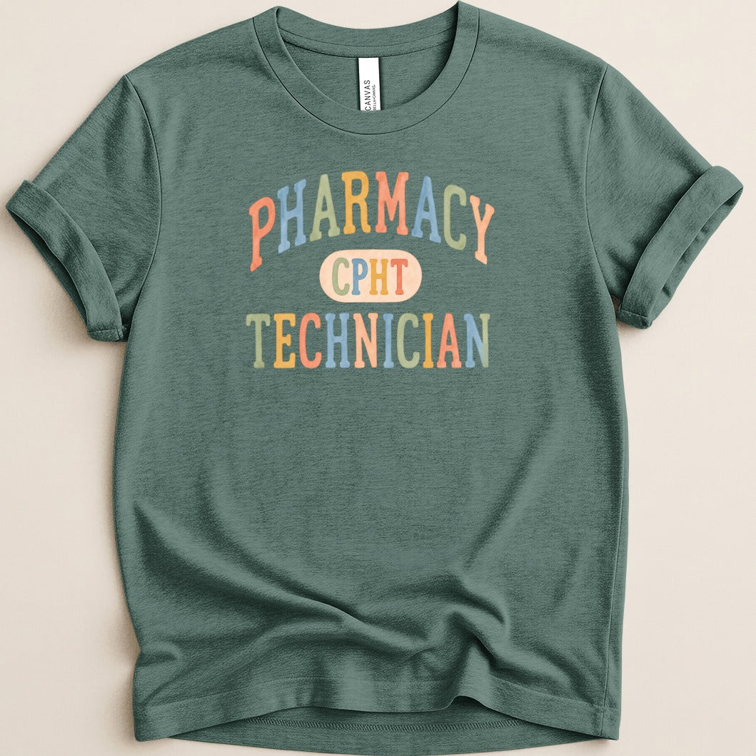 Green t-shirt with colorful text "PHARMACY TECHNICIAN"