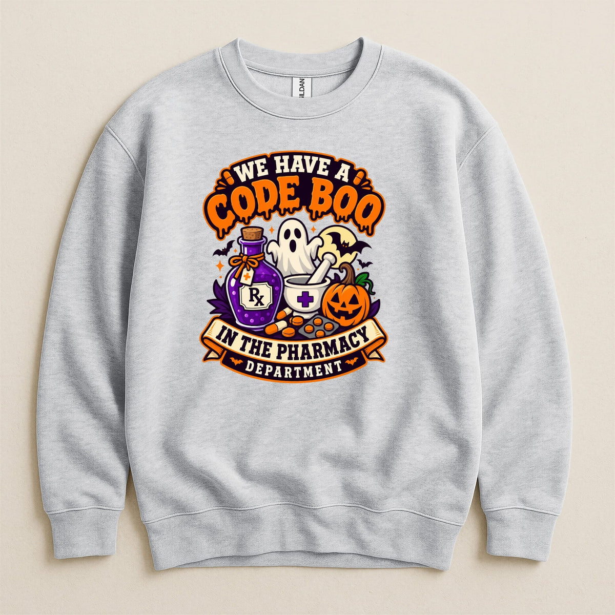 Gray sweatshirt with "We Have A Code Boo In The Pharmacy Department" Halloween graphic.