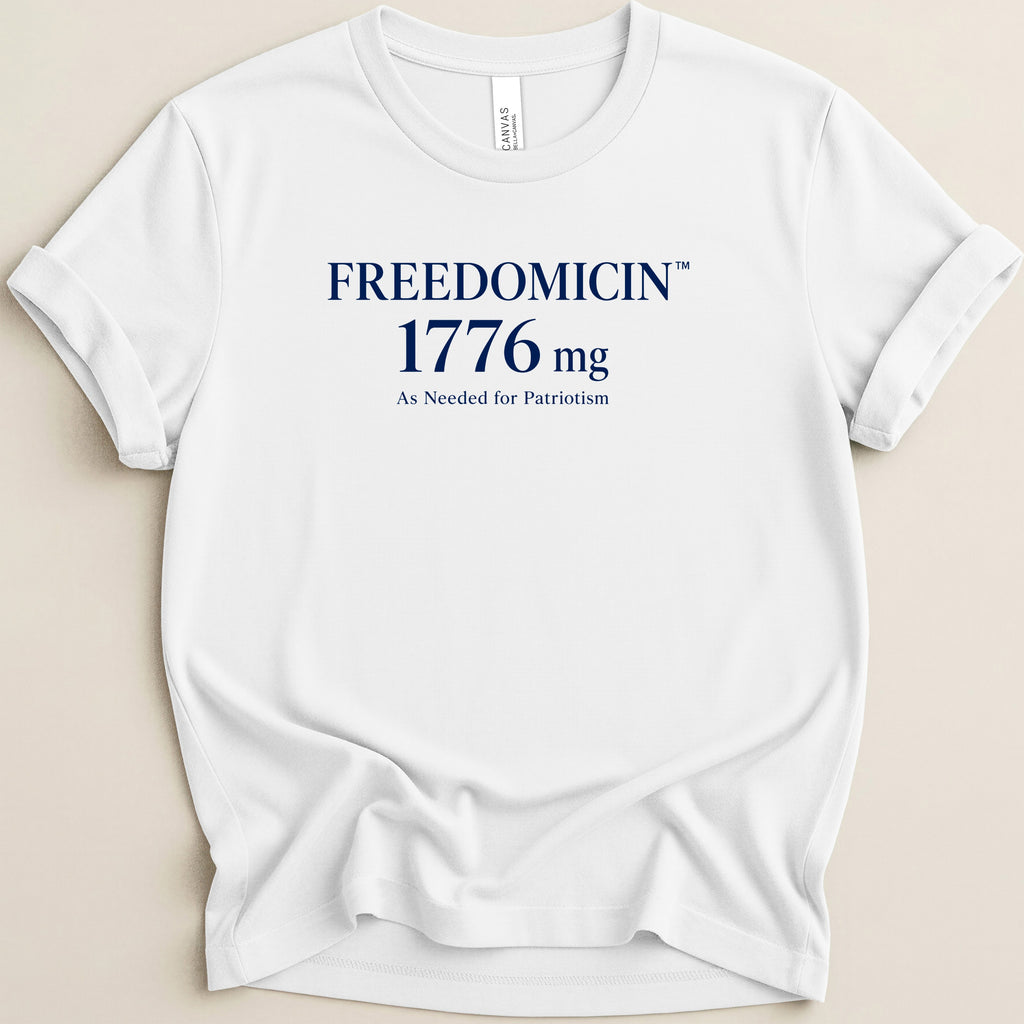 White t-shirt with navy blue text: FREEDOMICIN 1776 mg As Needed for Patriotism.