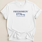 White t-shirt with navy blue text: FREEDOMICIN 1776 mg As Needed for Patriotism.