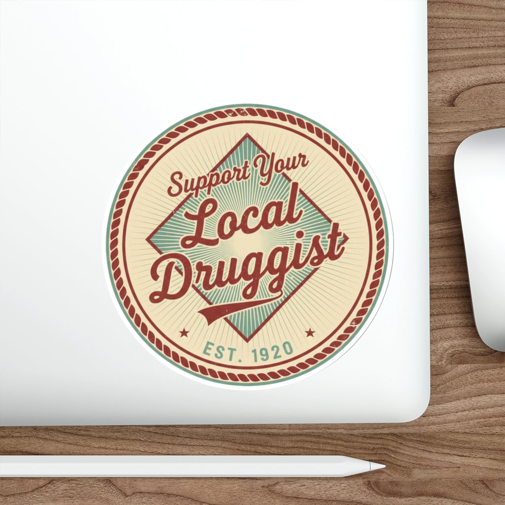 Round sticker with "Support Your Local Druggist EST. 1920" text.