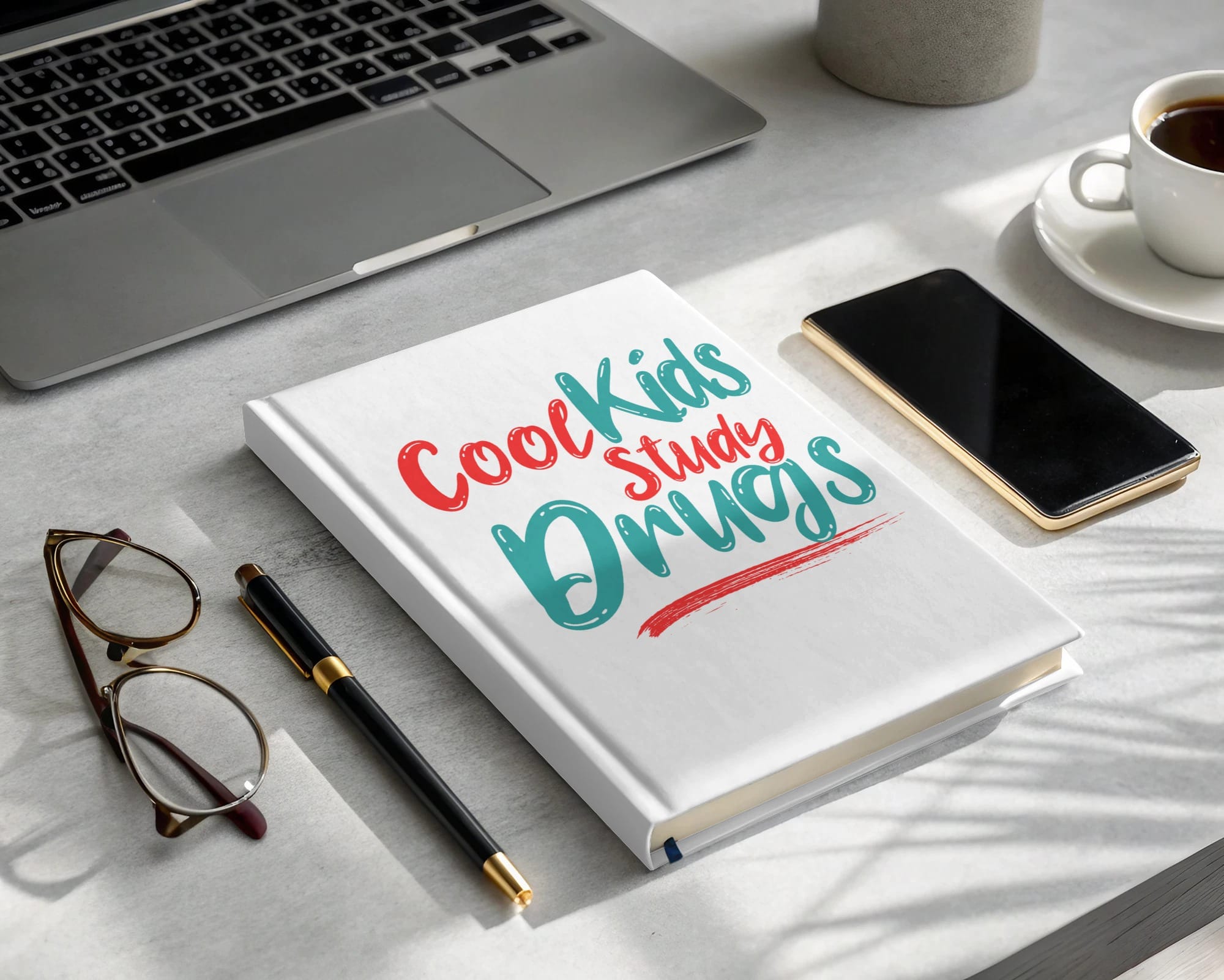 Cool Kids Study Drugs notebook with glasses, pen, laptop, phone, and coffee.