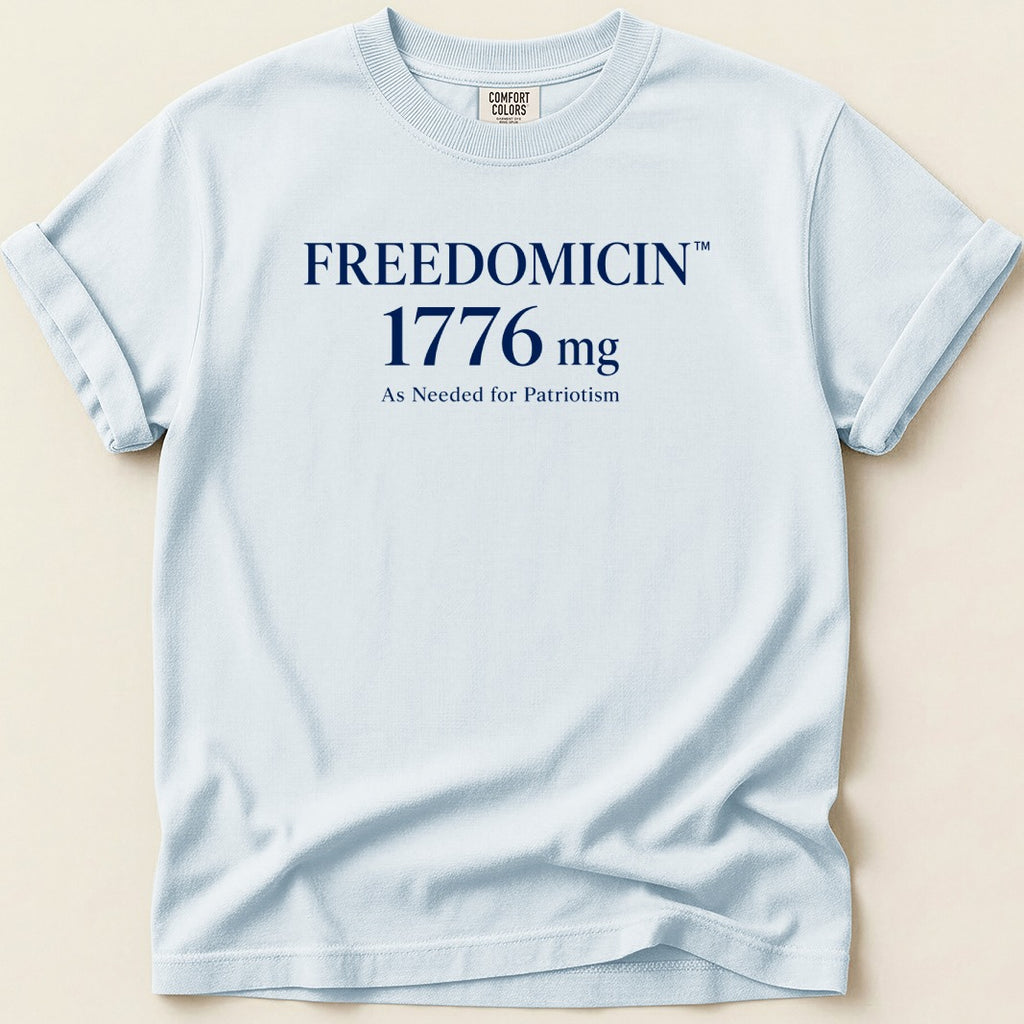 Light blue t-shirt with "FREEDOMCIN 1776 mg As Needed for Patriotism" text.
