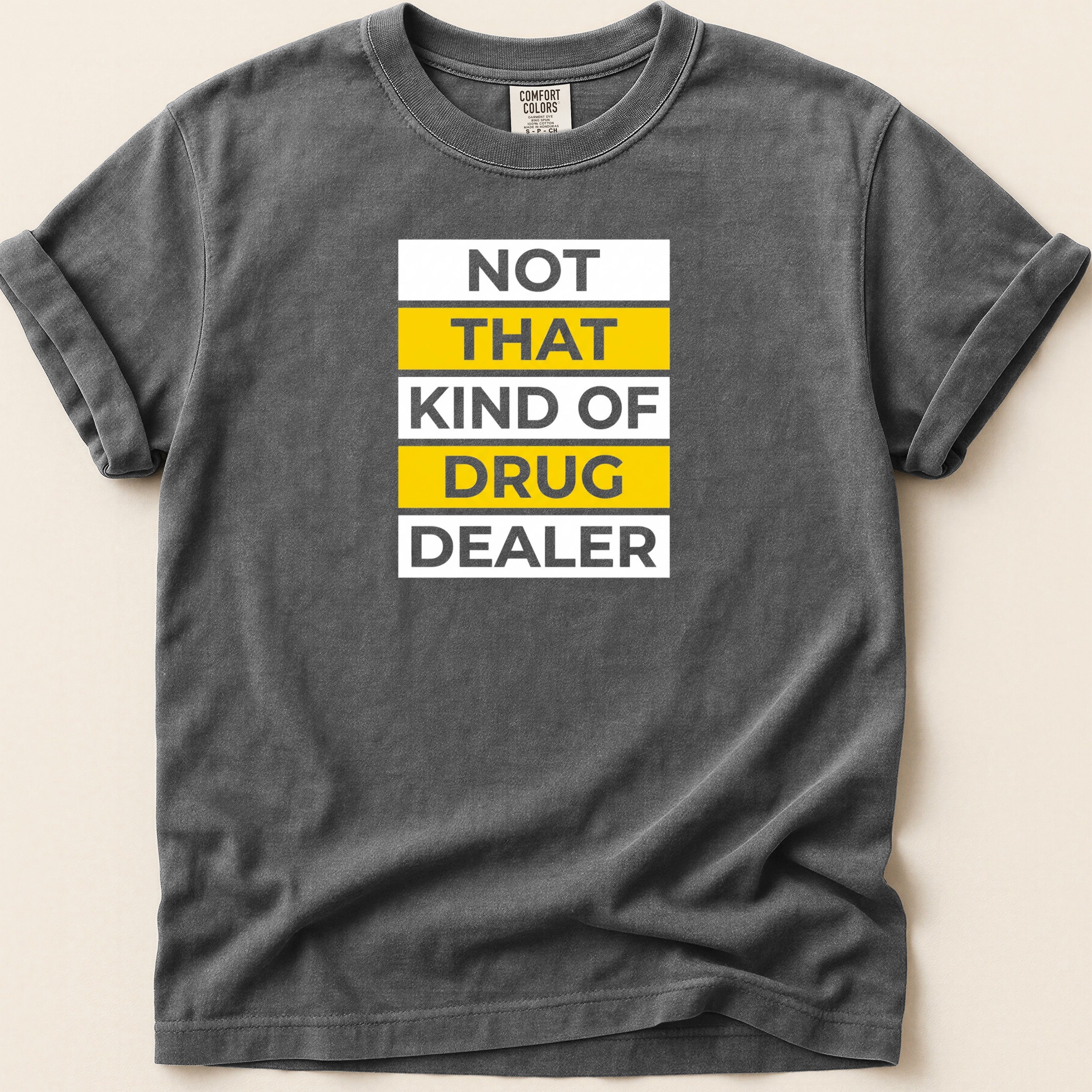 Charcoal t-shirt with "NOT THAT KIND OF DRUG DEALER" text.