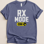 Blue t-shirt with white text "RX MODE ON" and yellow pill icon.