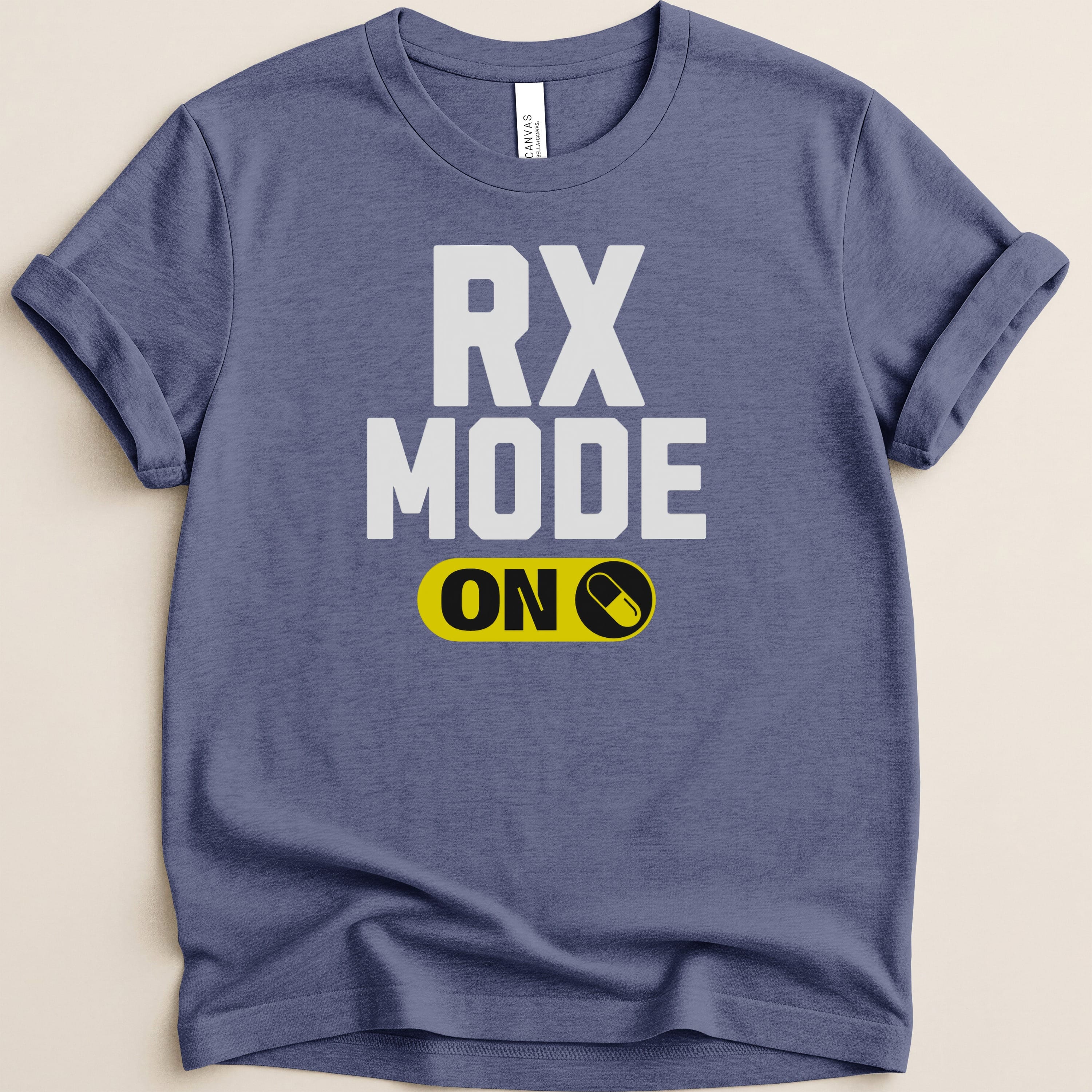 Blue t-shirt with white text "RX MODE ON" and yellow pill icon.
