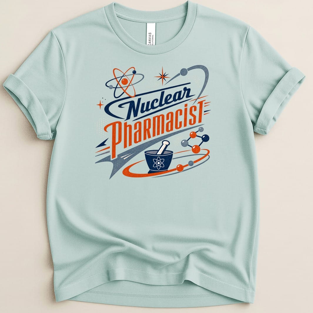 Light blue t-shirt with "Nuclear Pharmacist" text and atomic graphics.