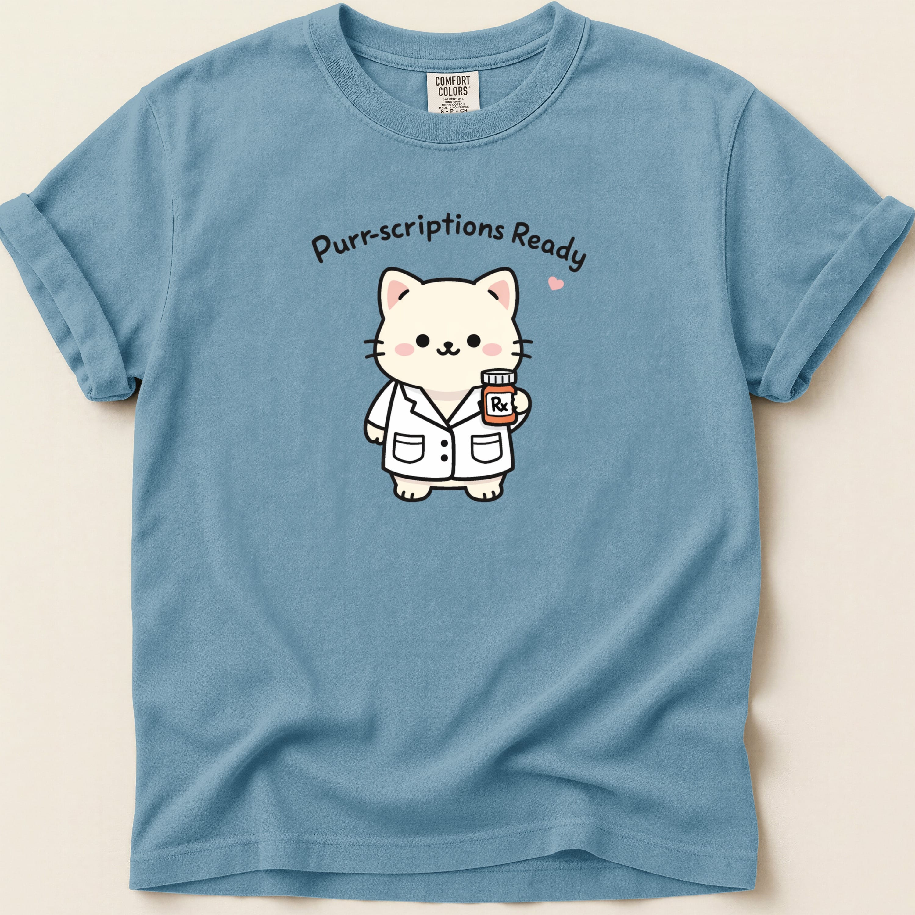 Cat wearing a lab coat holding an Rx bottle, text "Purr-scriptions Ready".