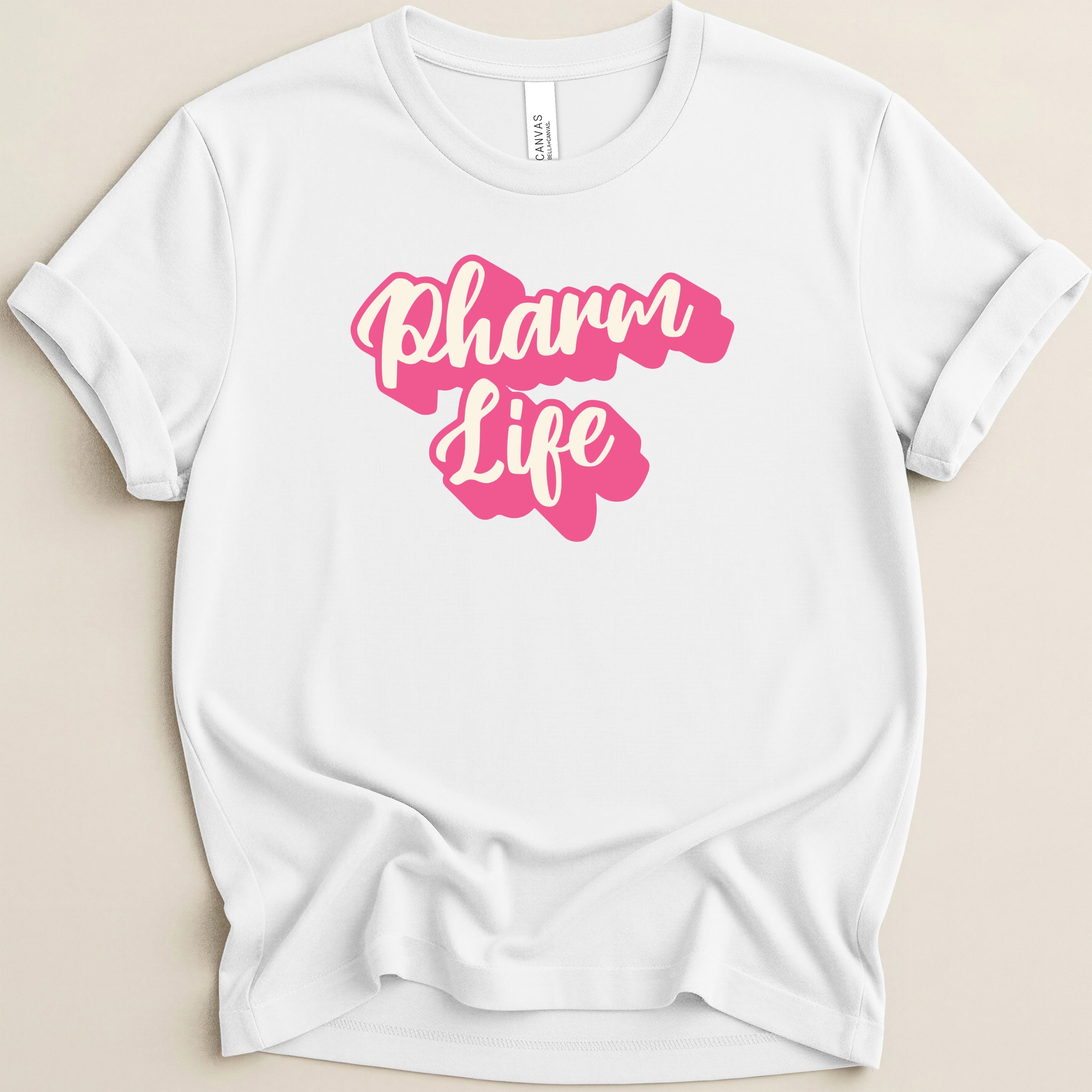 White t-shirt with pink text "Pharm Life" across the chest.