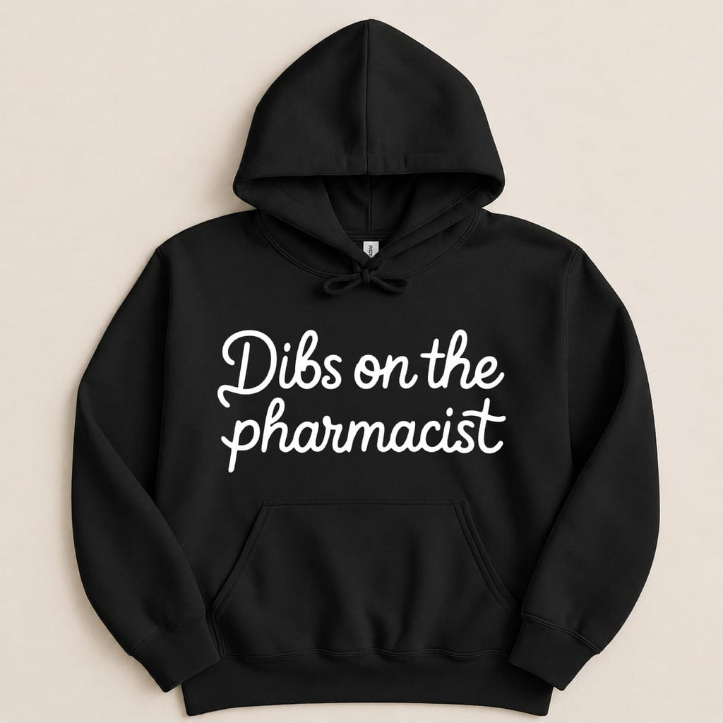 Black hoodie with white script text "Dibs on the pharmacist".