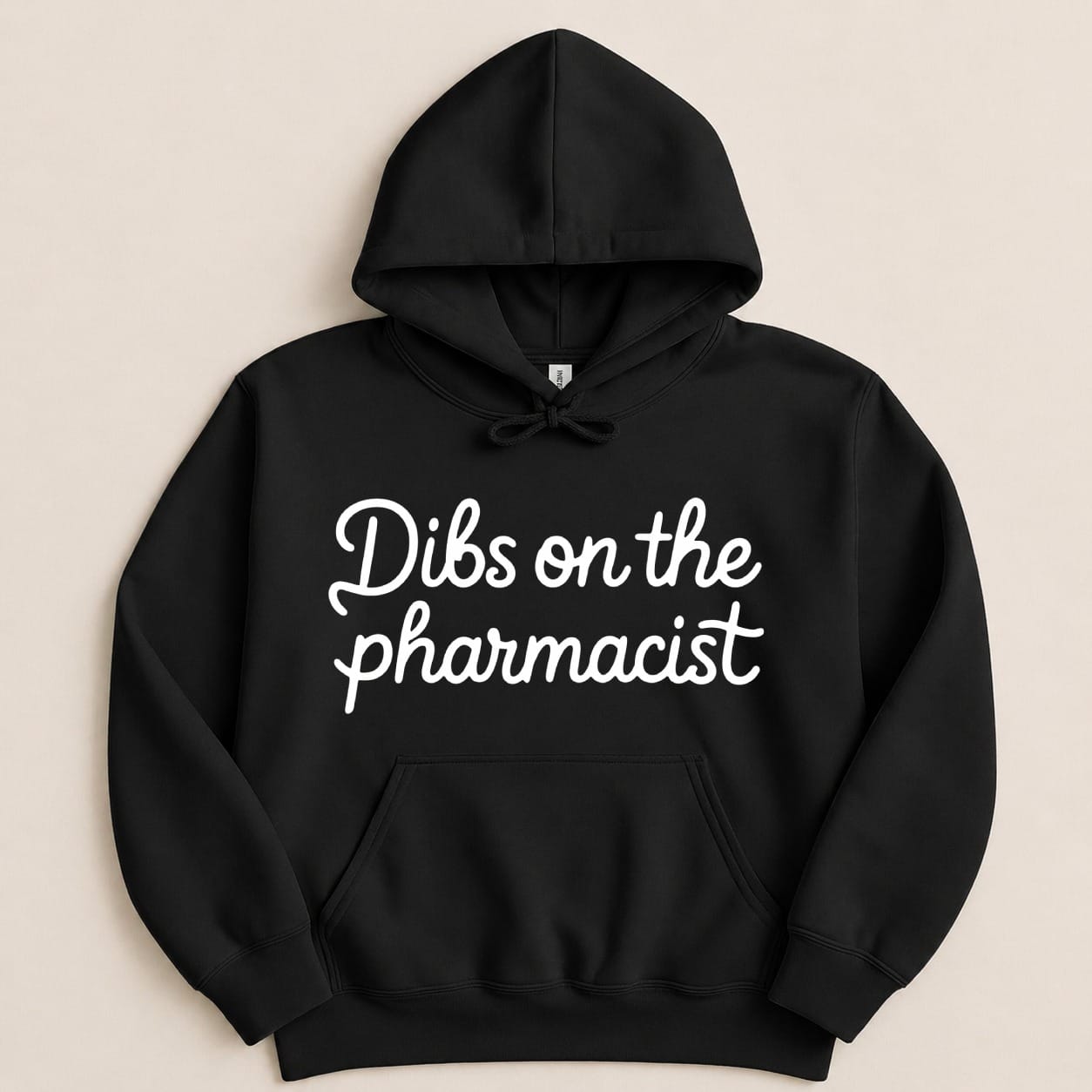 Black hoodie with white script text "Dibs on the pharmacist".