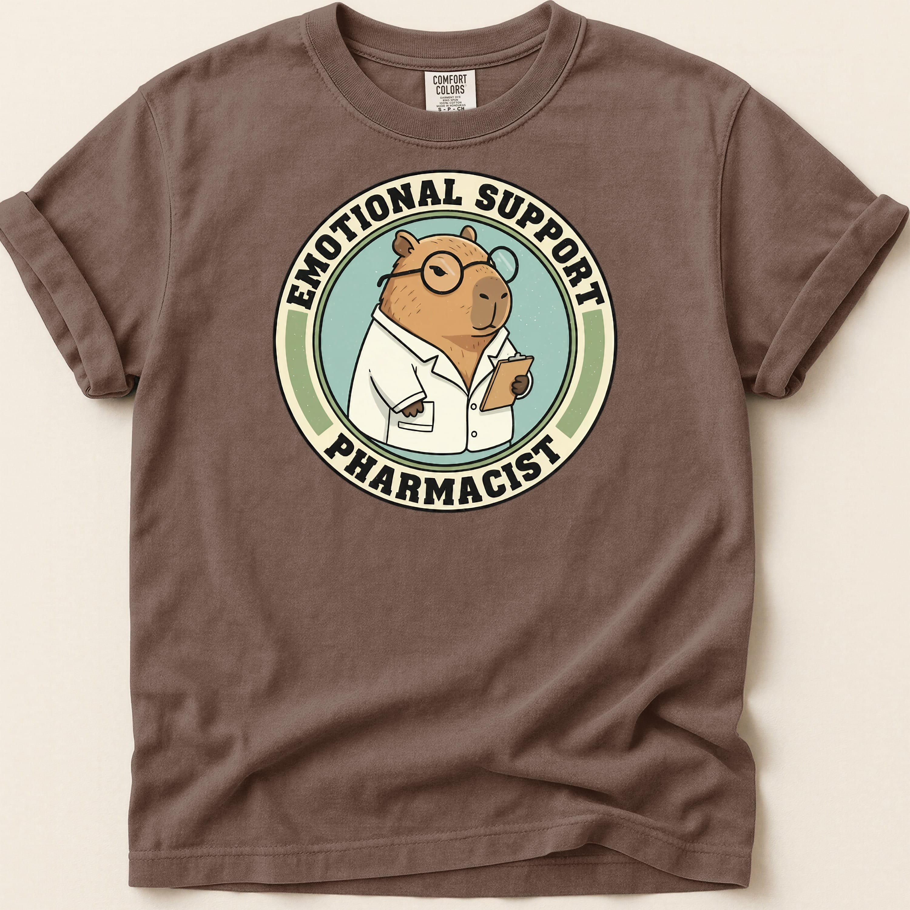 Capybara wearing lab coat and glasses, text "Emotional Support Pharmacist".