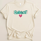 Cream t-shirt with "PHARMACIST" in teal and a pink heart.