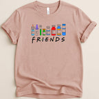 "Friends" TV show logo with medical vials instead of letters on a pink t-shirt.