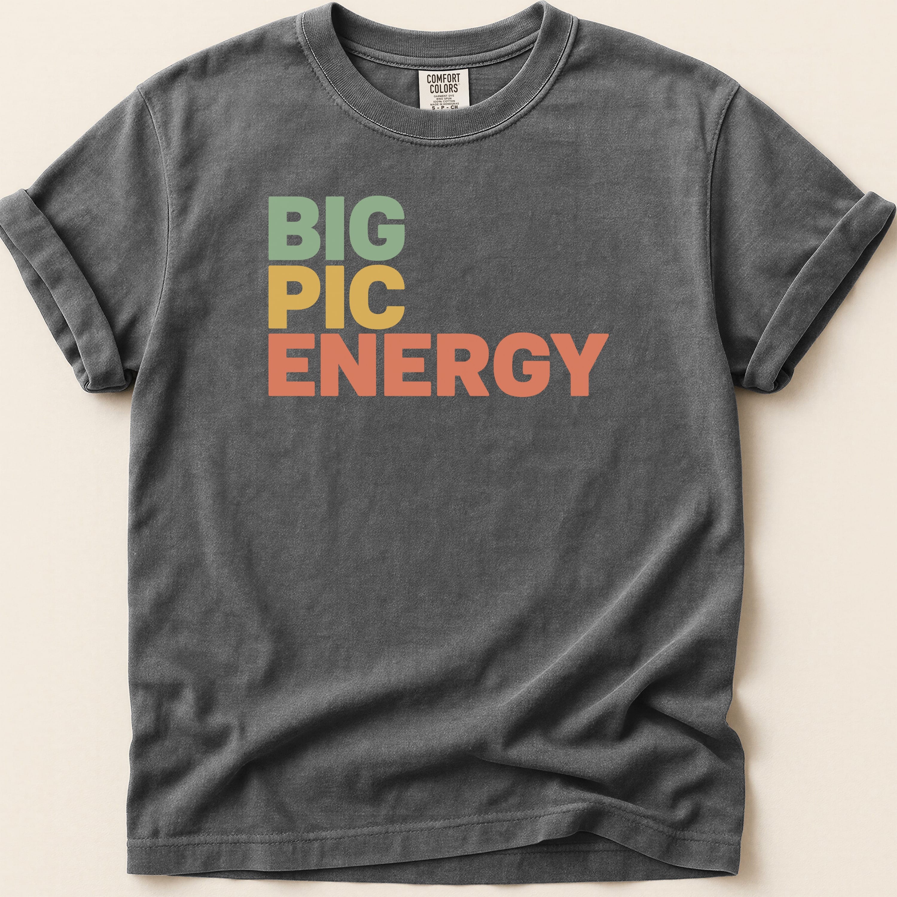 Dark gray t-shirt with "BIG PIC ENERGY" in colorful block letters.