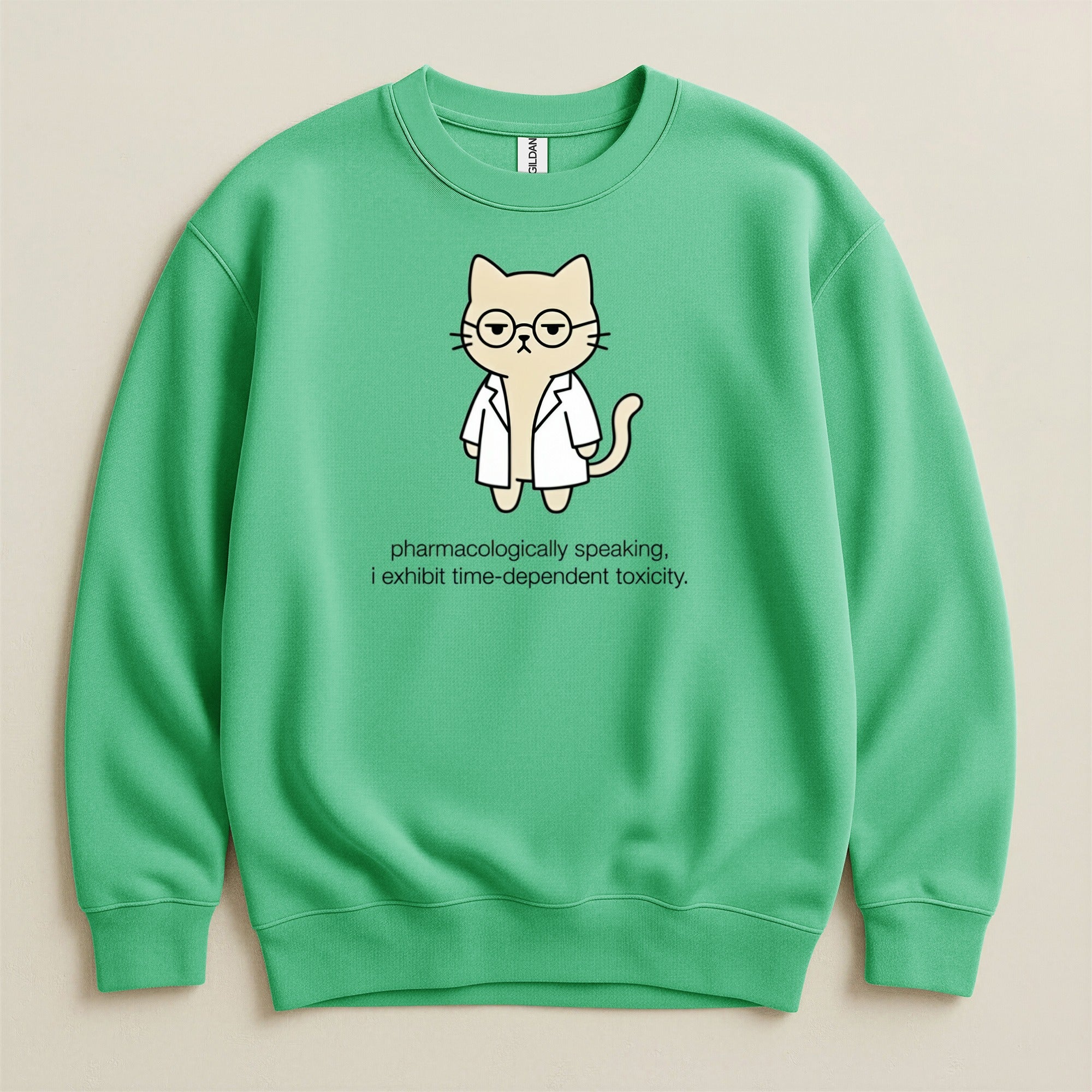 Green sweatshirt with a cartoon cat wearing a lab coat and glasses.