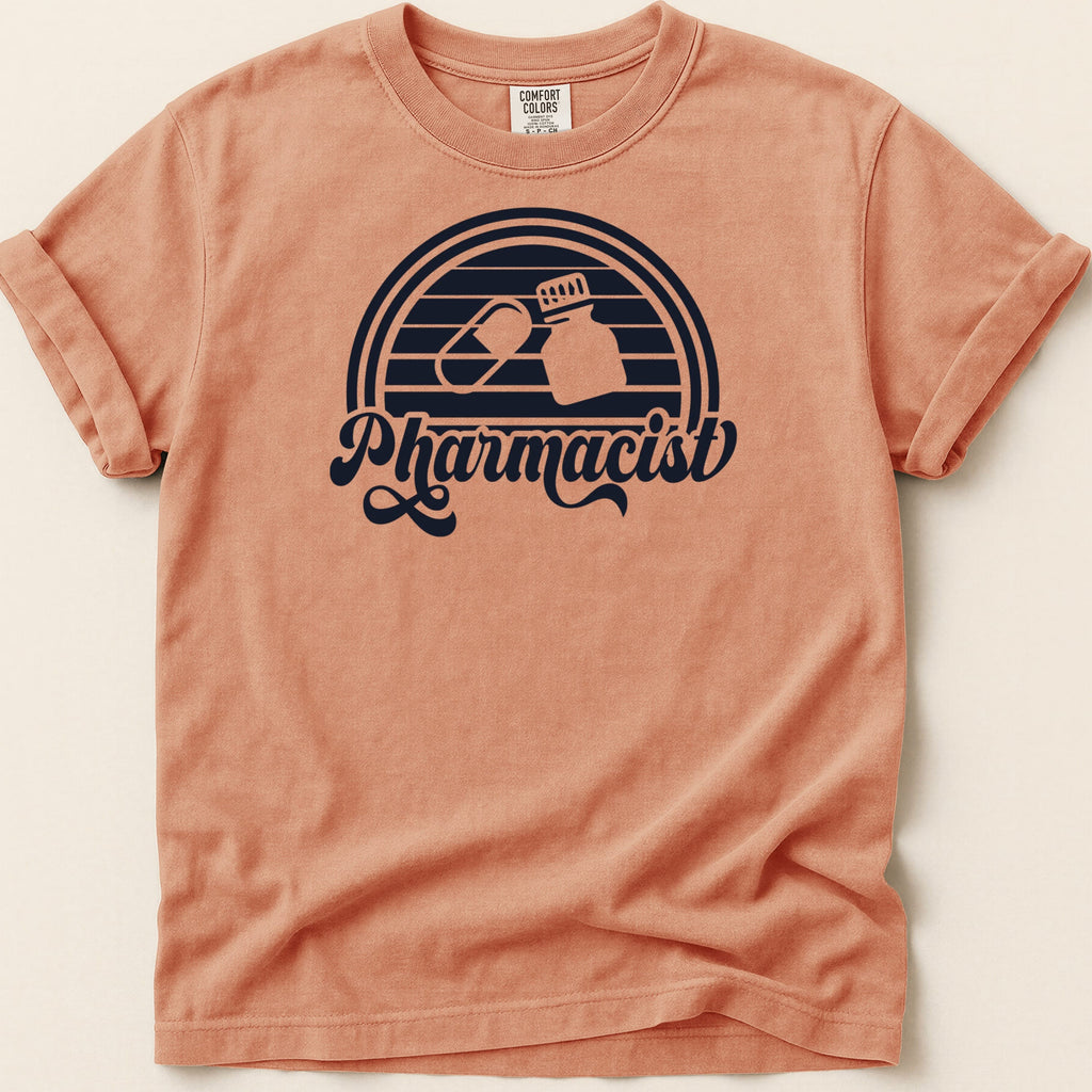 Orange t-shirt with "Pharmacist" text and pill bottle graphic.