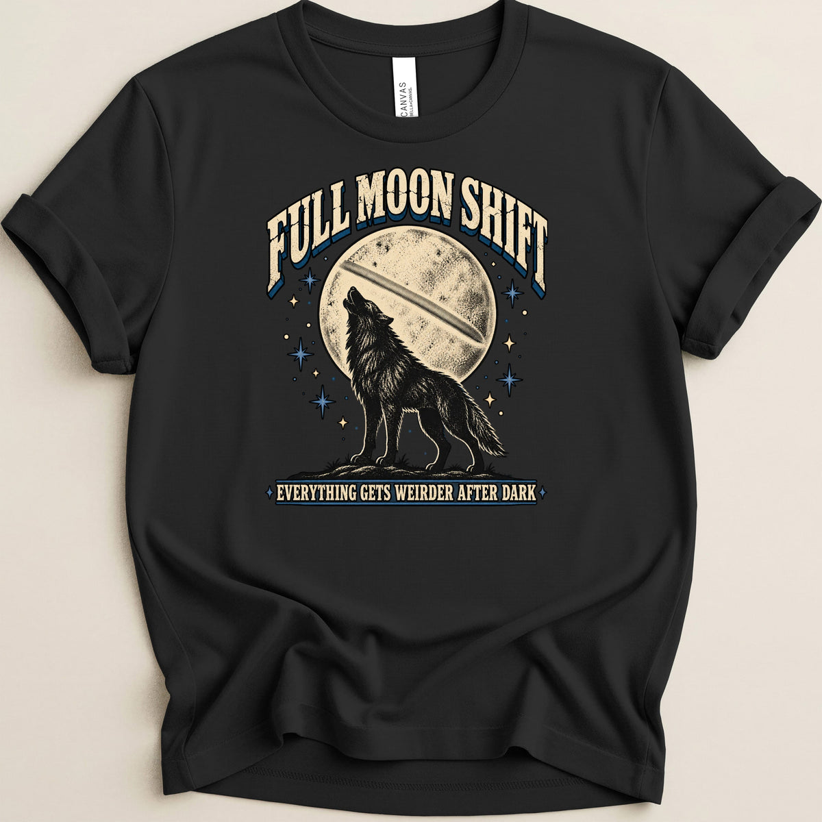 Black t-shirt with wolf howling at full moon graphic and text.