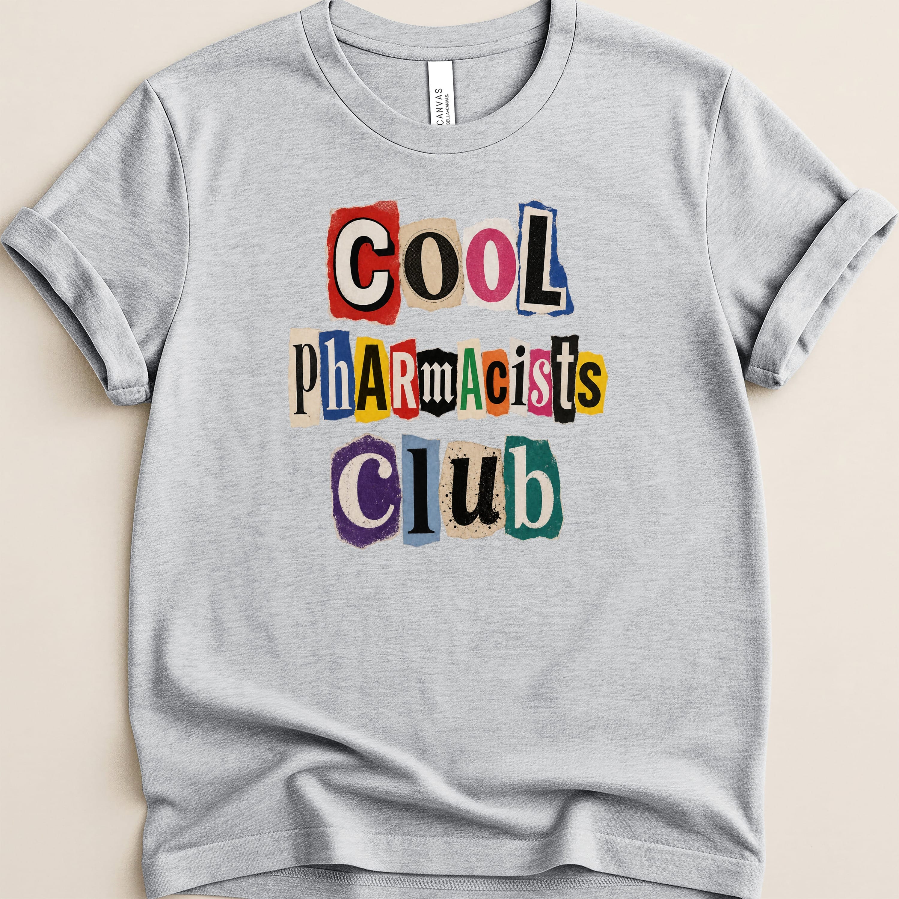 Gray t-shirt with "Cool Pharmacists Club" in colorful, cut-out letters.