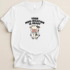 White t-shirt with cartoon cow doctor holding a cup, text reads "Your moo-dication is ready".