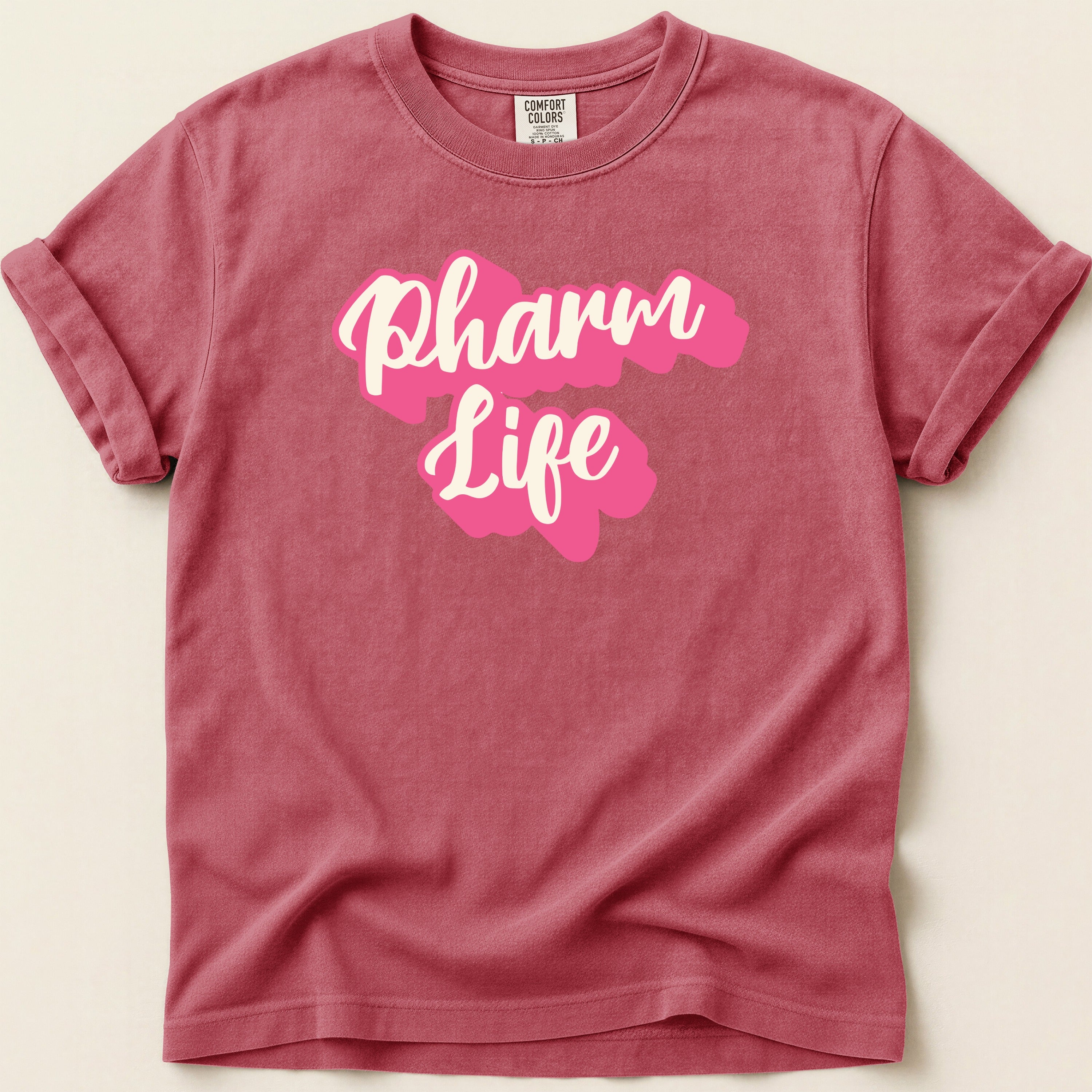 Red Comfort Colors t-shirt with "Pharm Life" in pink script.